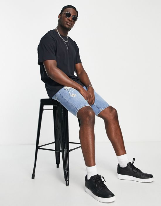 https://images.asos-media.com/products/soul-star-tall-oversized-t-shirt-in-black/201903428-3?$n_550w$&wid=550&fit=constrain
