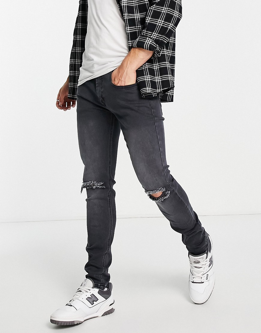 Soulstar skinny fit ripped jeans in washed black