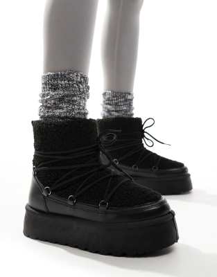 Borg Lace Up Platform Mini Boot in Black