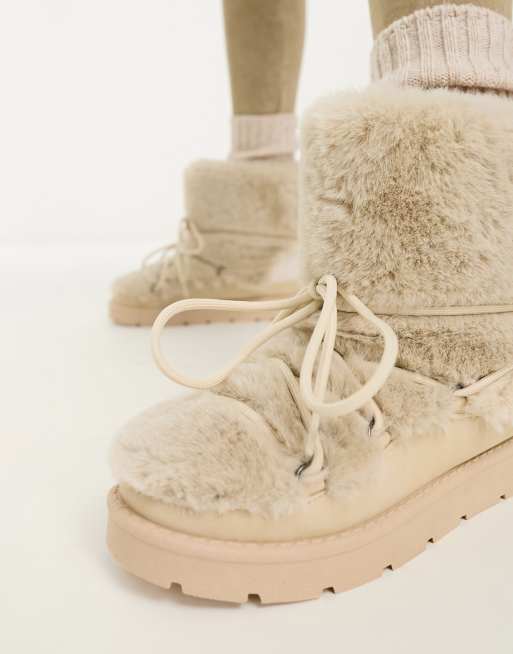 South Beach Bottes de neige en fausse fourrure Beige ASOS