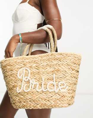 South Beach bride embroidered straw bucket bag in beige