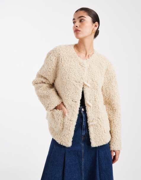 South Beach button up curly fur jacket in beige 