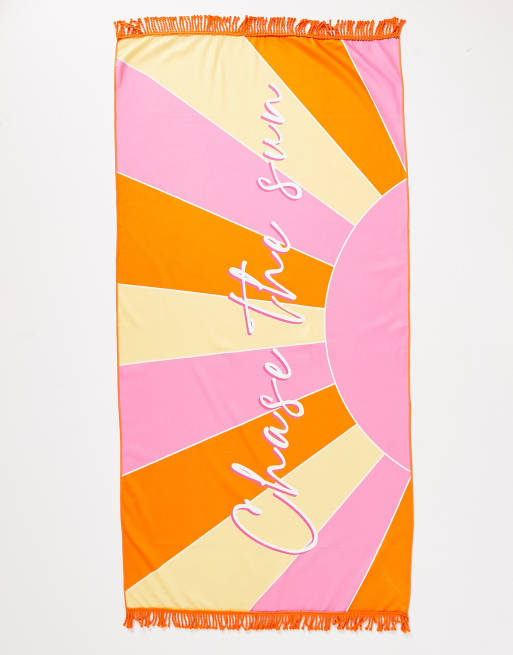 South Beach chase the sun beach towel in pink and orange sun print
