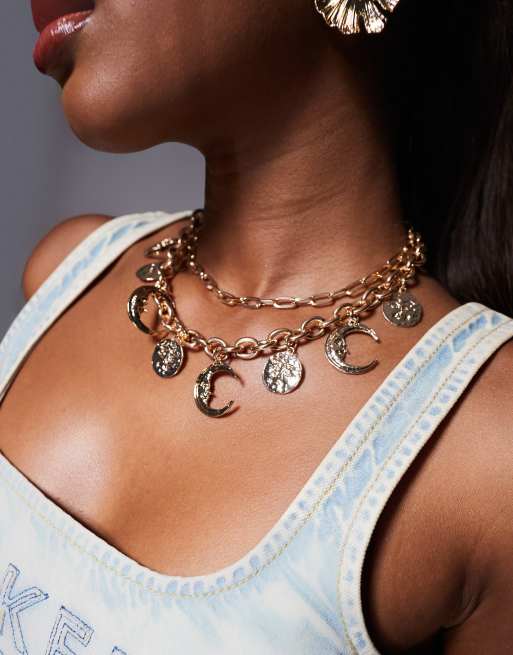 South Beach - Chunky ketting met astrologische hangertjes in goud