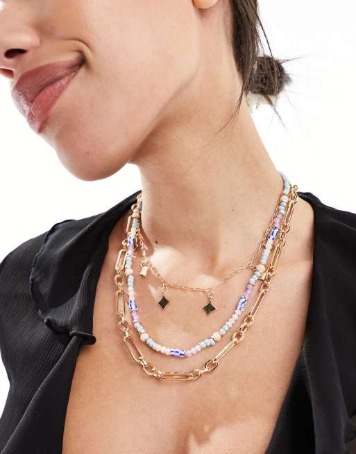 South Beach - Collana dorata multifilo con perline e charms