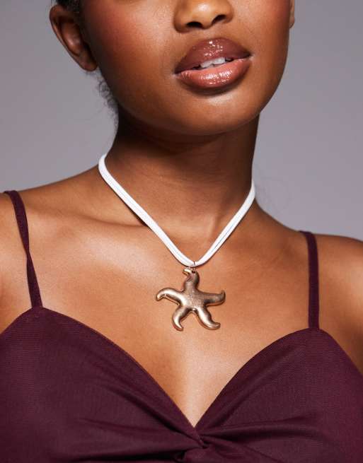 South Beach - Collana in corda con pendente color oro a forma di stella marina