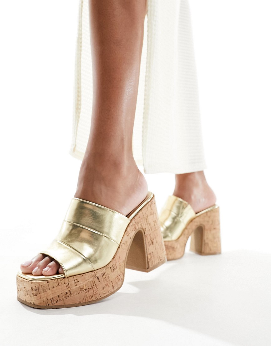 South Beach cork heeled mules in gold