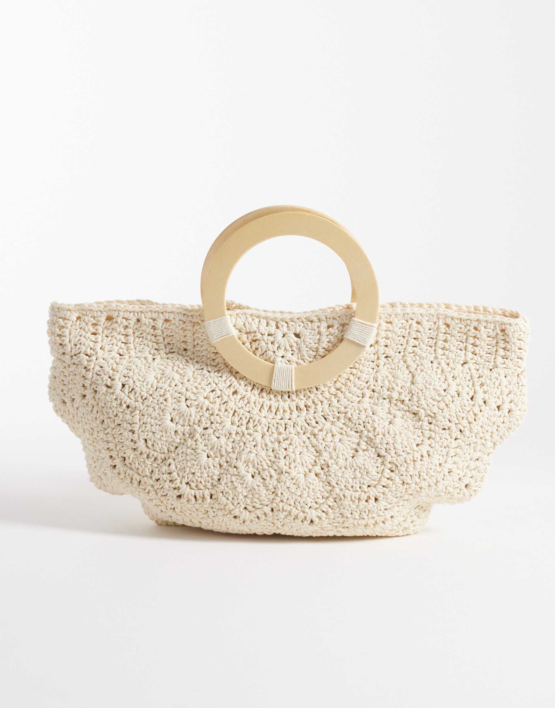 south beach crochet clutch bag with wooden handle in cream