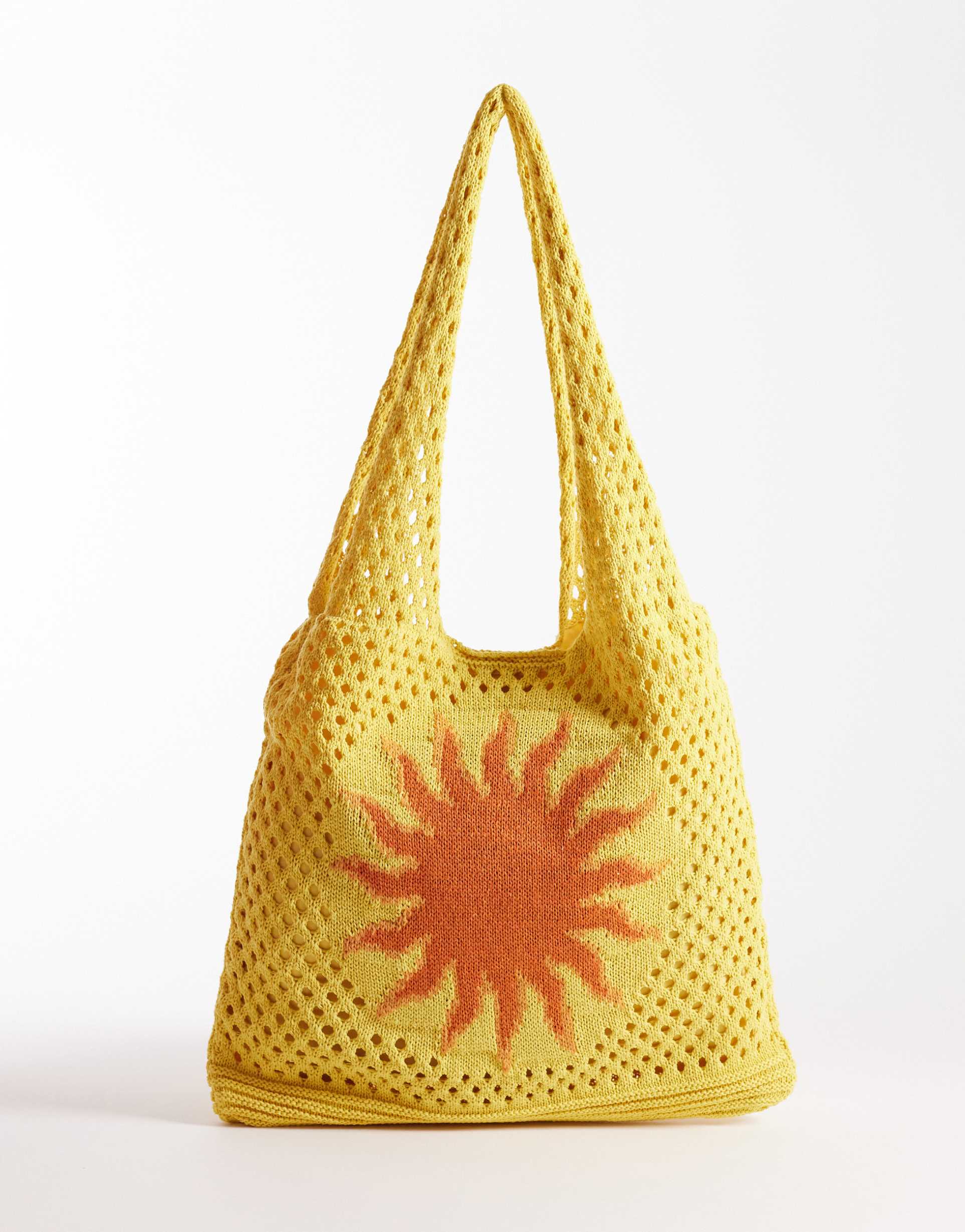 south beach crochet tote bag with sun print in yellow