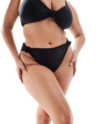 South Beach Curve - Schwarze Bikinihose mit hohem Bund und geknoteter Seite