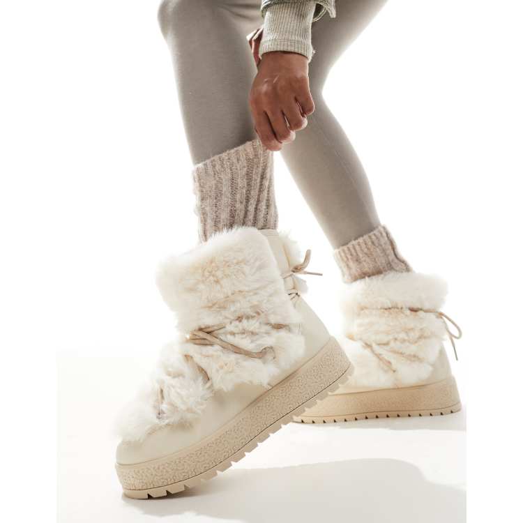 South Beach Faux Fur Lace Up Ankle Boots in Cream ASOS
