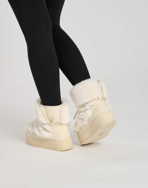 South Beach Faux fur lace up snow boot in cream ASOS