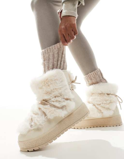 South Beach Faux Fur Lace Up Snow Boots in Cream ASOS