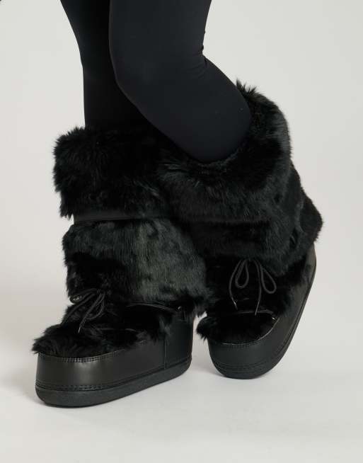 South Beach Fluffy knee snow boot in black in black | ASOS