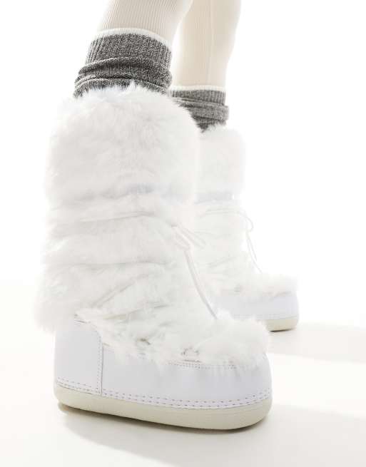 South Beach Fluffy Knee Snow Boot in White ASOS