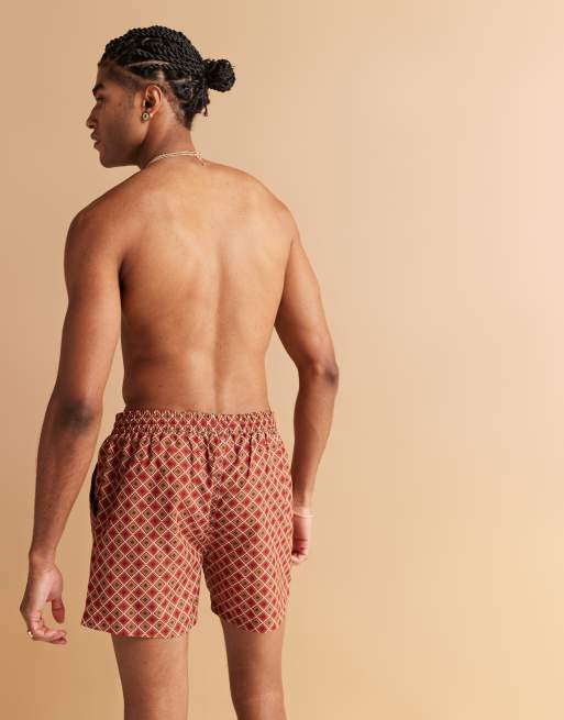 South Beach geo print swim shorts in rust