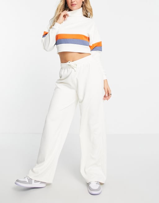 South Beach - Geribbelde joggingbroek met wijde pijpen in gebroken wit 