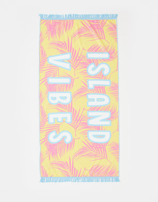 South Beach island vibes beach towel in yellow and pink palm leaf print 