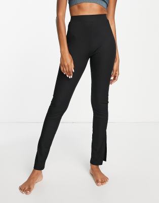 South Beach - Leggings aus Polyester in Schwarz mit seitlichem Schlitz