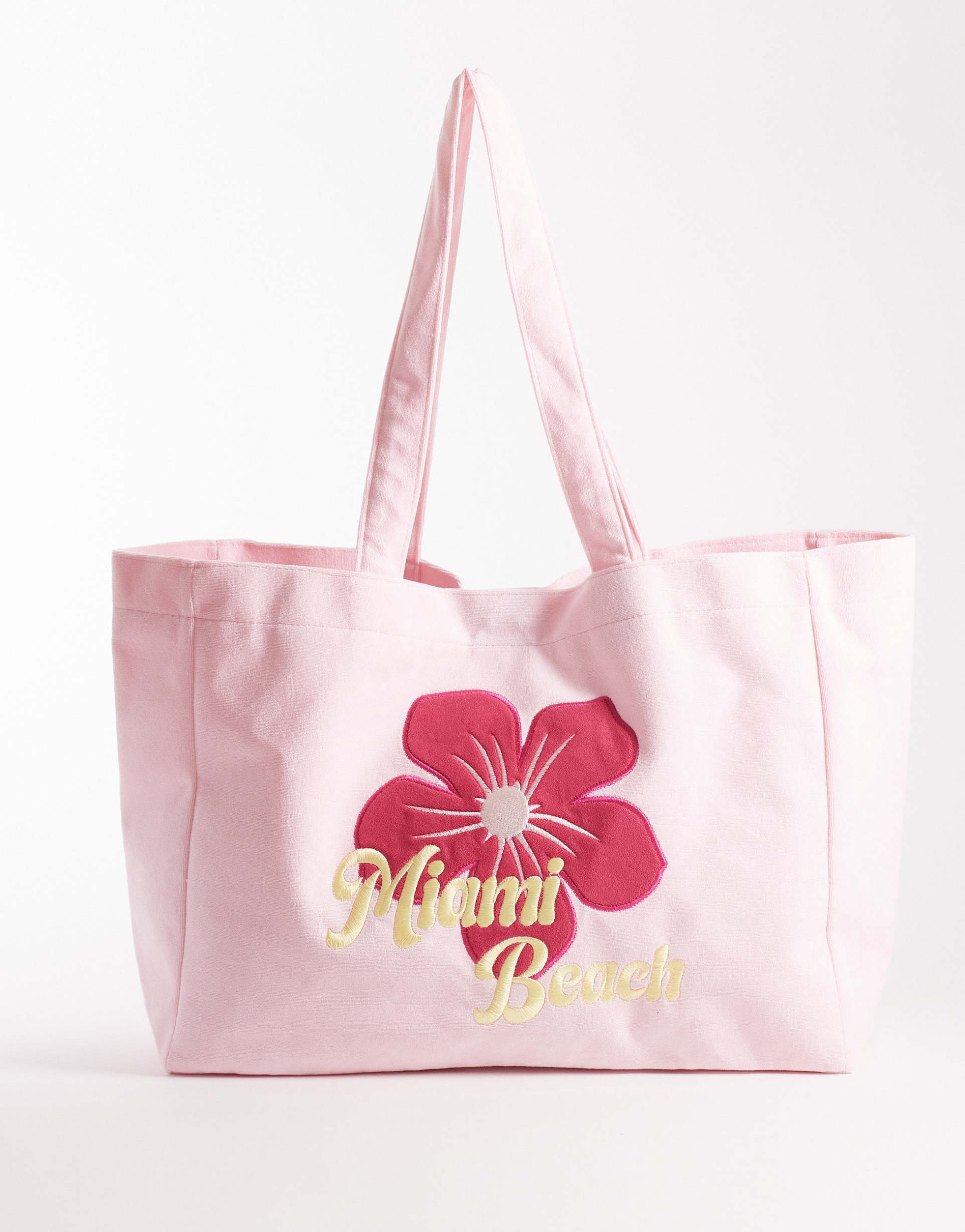 south beach miami beach printed terrycloth tote bag in pale pink