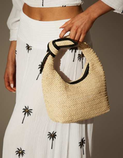 South Beach Mini clutch bag with bow tie in beige - view 1
