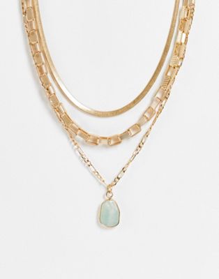 South Beach multirow mixed chains necklace with blue stone in gold