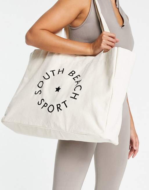 South Beach – Naturvit toteväska i oversize och canvas med logga