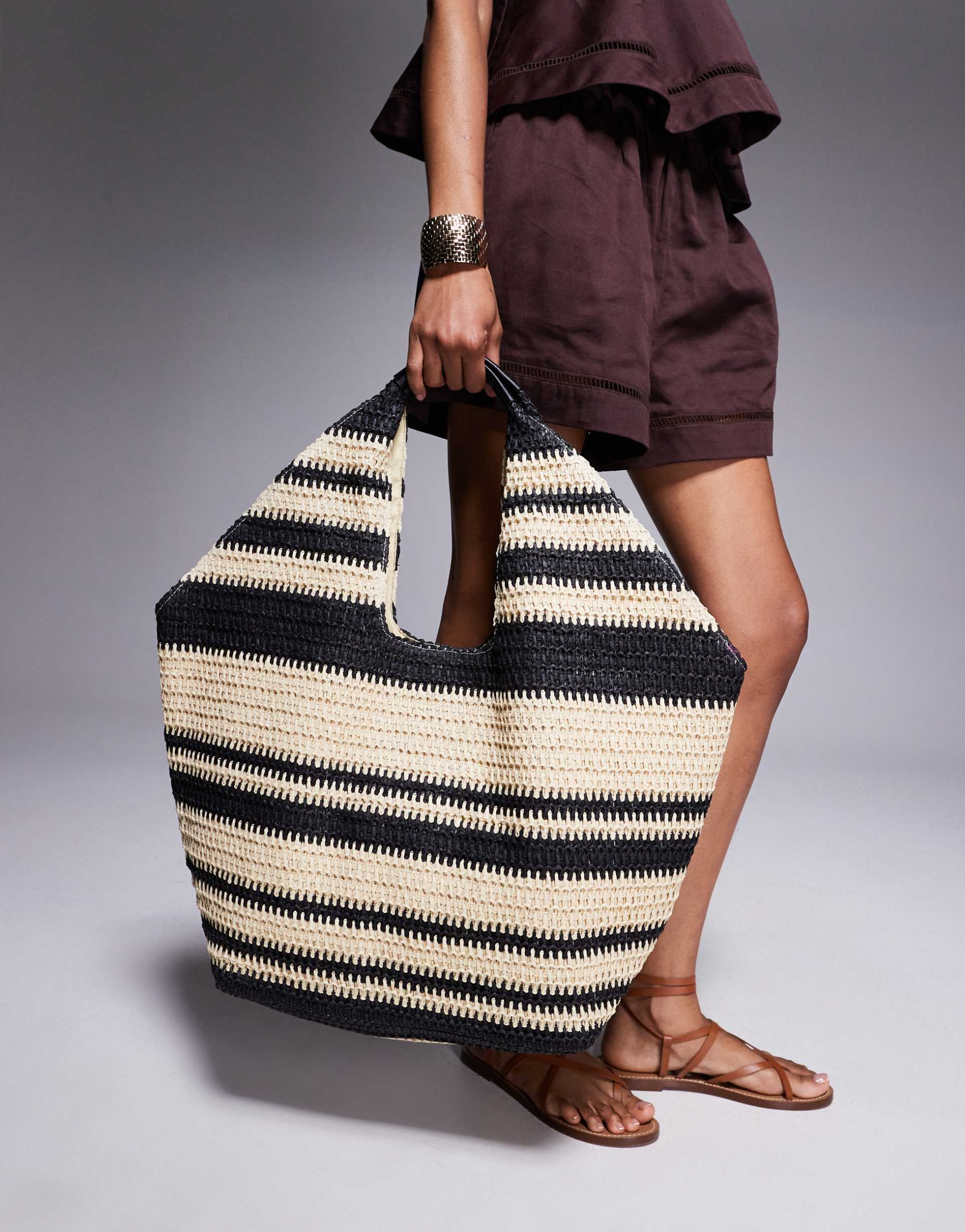south beach oversized landscape straw tote bag in black stripe
