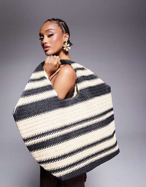South Beach oversized landscape straw tote bag in black stripe