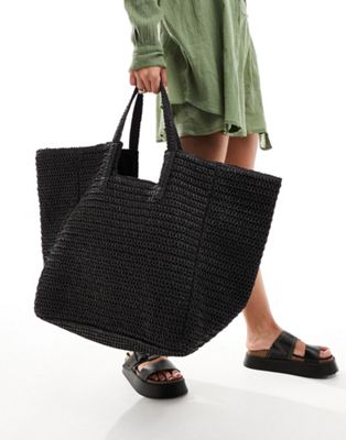 oversized woven shoulder bag in black