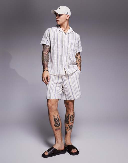 South Beach - Pantaloncini da mare color crema a righe blu in coordinato