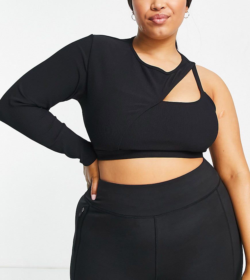 Plus-size top by South Beach Exclusive to ASOS Crew neck One-sleeve style Fixed strap Cut-out details Cropped length Slim fit