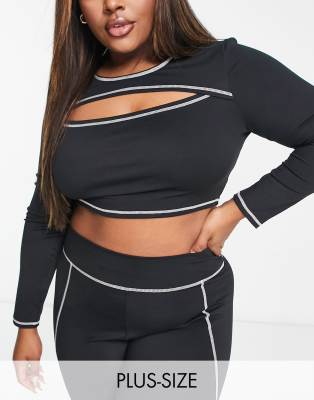 South Beach Plus over lock stitch cut out long sleeve top in black