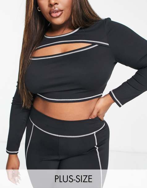 South Beach Plus over lock stitch cut out long sleeve top in black - view 1