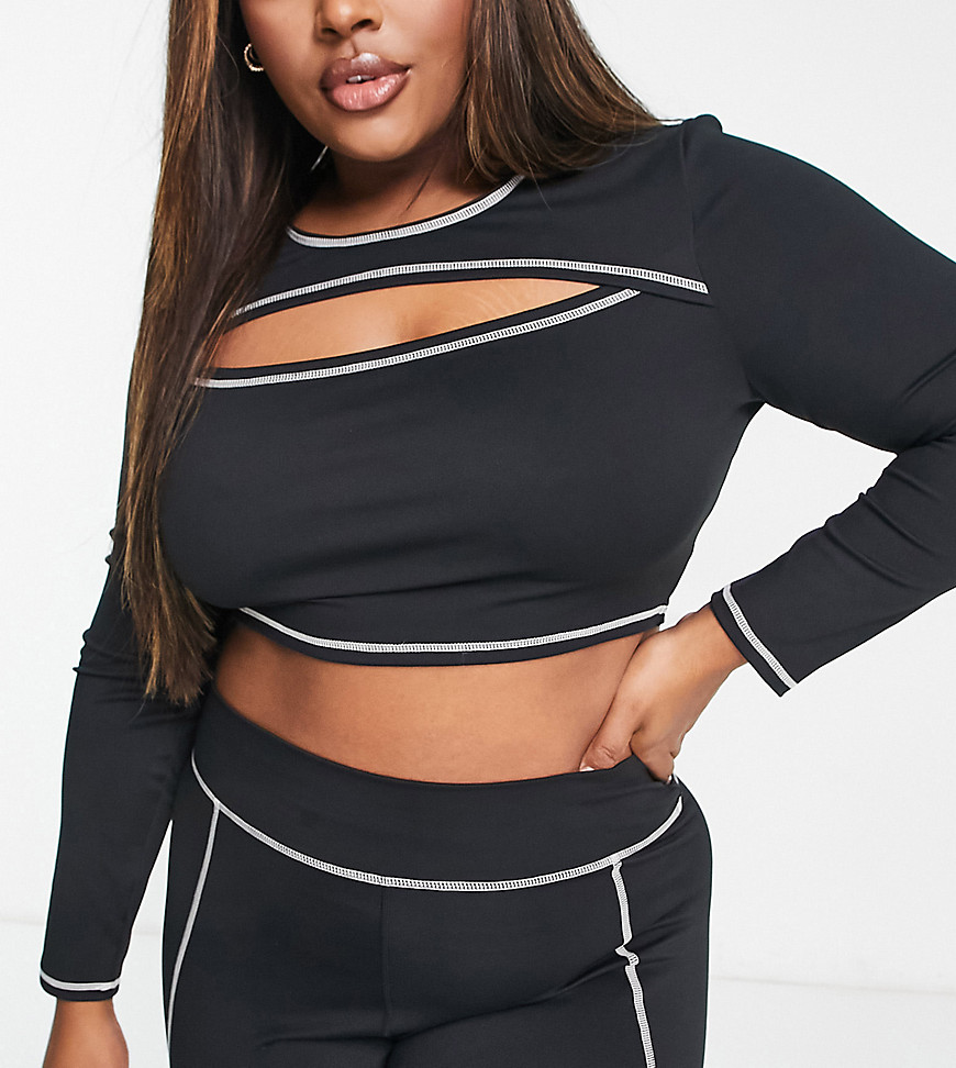 South Beach Plus over lock stitch cut out long sleeve top in black