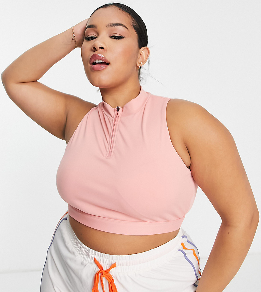 Plus-size top by South Beach Exclusive to ASOS High neck Partial zip fastening Sleeveless style Cropped length Slim fit