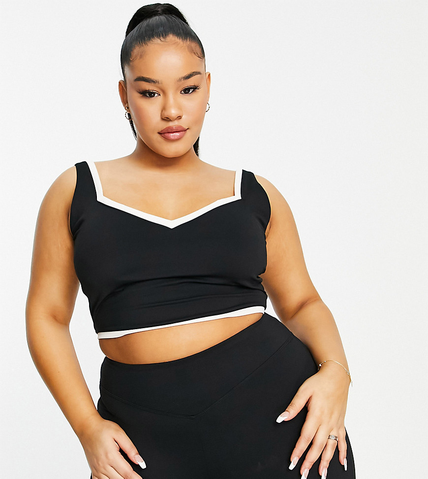 Plus-size top by South Beach Exclusive to ASOS Sweetheart neck Sleeveless style Cropped length Slim fit