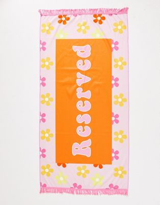South Beach reserved beach towel in pink and orange retro floral print