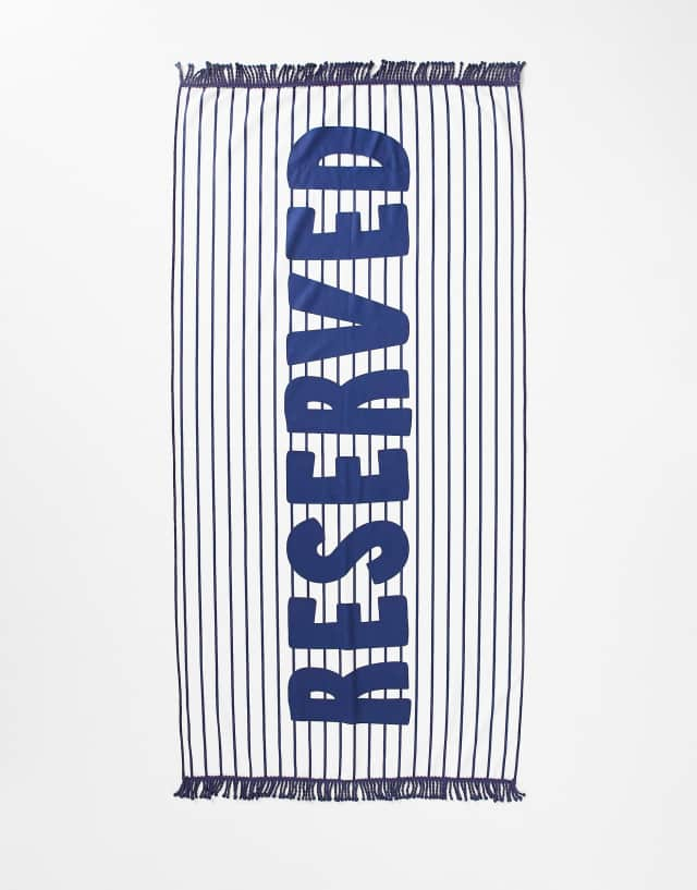 South Beach Reserved towel in navy stripes