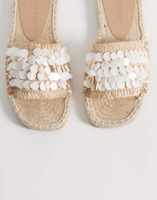 South Beach - Sandalen met band met schelpen in naturel, 2 van 4