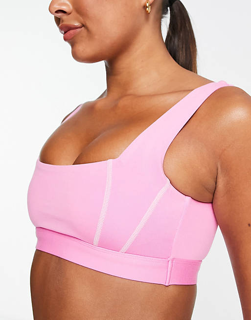 South Beach seam detail light support sports bra with contrast stitch in  pink