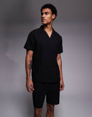 Shorts aus Seersucker in Schwarz Schwarz S