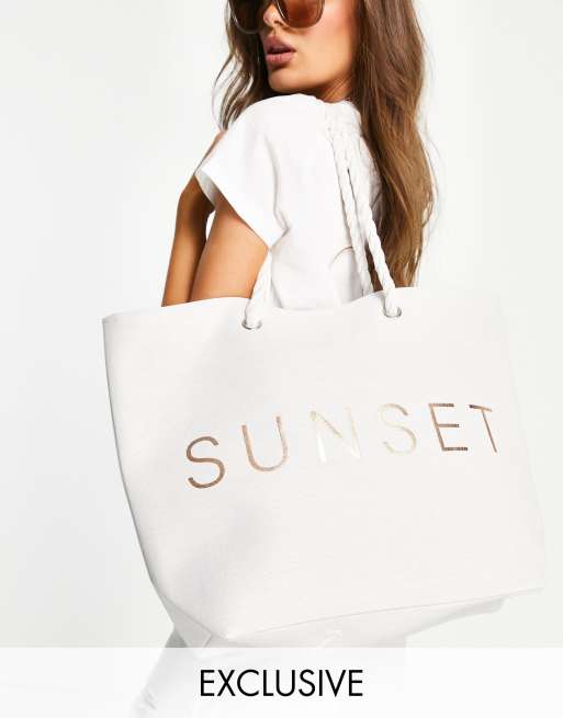 huurling bon blijven South Beach - Strandtas van canvas met 'Sunset' print in wit | ASOS