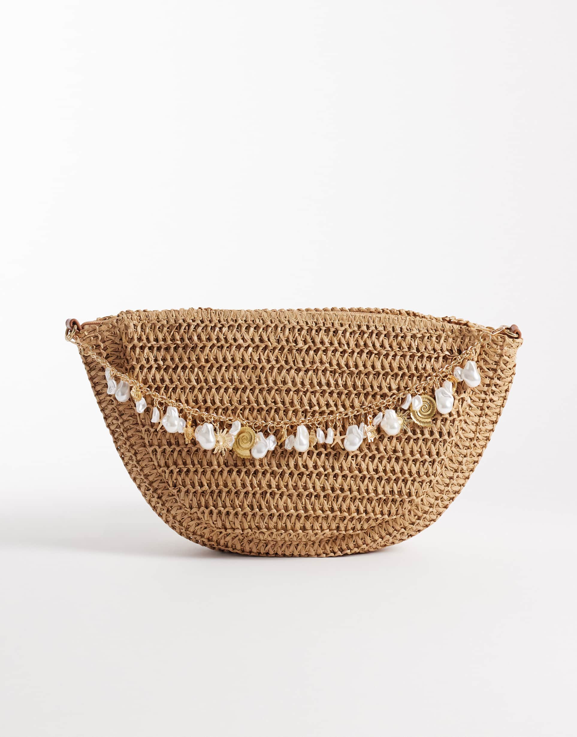 south beach straw crossbody bag with faux-shell embellishments in beige