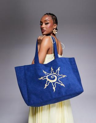 South Beach sun motif towelling tote bag in dark navy blue