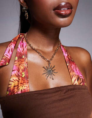 sun pendant necklace in gold