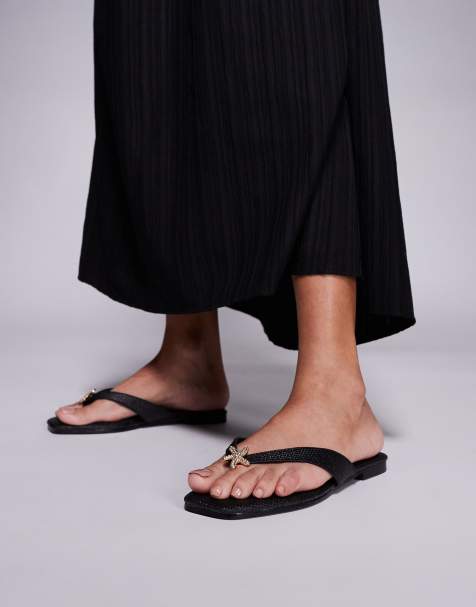 South Beach – Svarta flip flops i raffiabast med stjärnutsmyckningar - view 1