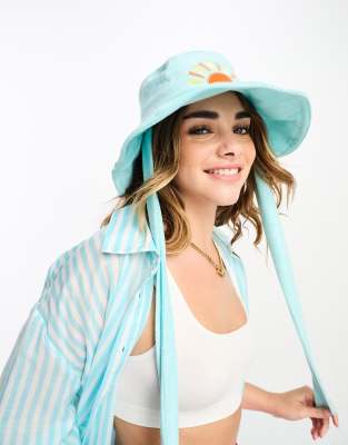 terrycloth bucket hat with ties in bright blue