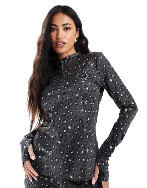 South Beach - Top base layer nero con zip corta