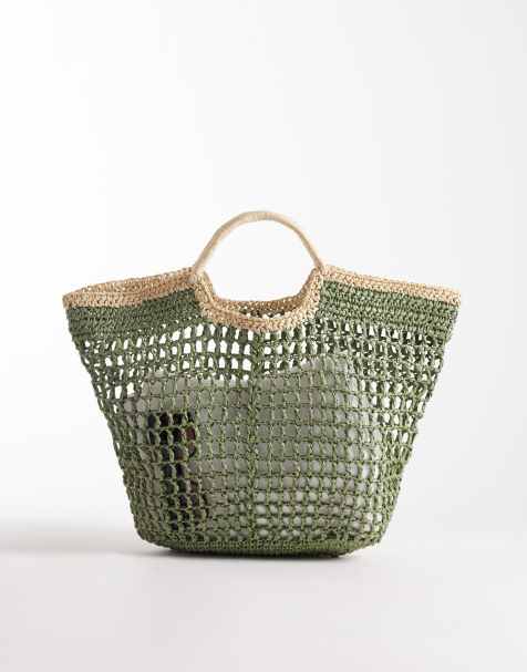South Beach top handle straw bag in green with contrast piping  - view 1